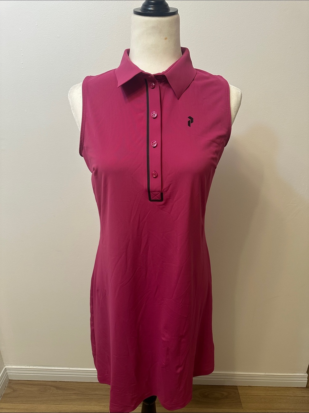 Peak Performance Sleeveless Polo Dress in Berry Pink